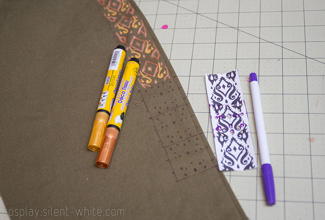 In progress photo of drawing a decorative trim with fabric markers